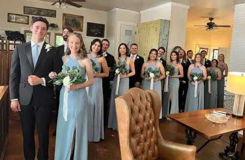 Bride, groom, bridesmaids, and groomsmen gathered during wedding preparations at a luxury Malibu wedding venue.