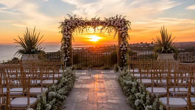 Sunset wedding ceremony on the terrace at L'Auberge Del Mar