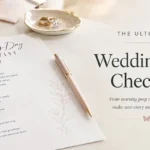 Printable ultimate wedding day checklist lying on a desk next to wedding rings and a pen.